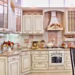 Design of white kitchen in the interior in vintage style