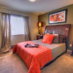 Bedroom decor taupe gray with orange accents