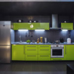 Refrigerator in the interior of the kitchen linear configuration