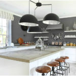 The gray palette of the kitchen is diluted with white ceilings