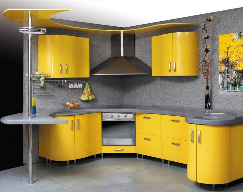 A gray kitchen palette combined with yellow