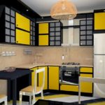 การรวมกันของการตกแต่งภายในห้องครัวสีดำและสีเหลืองบนพื้นหลังสีเบจ