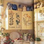 DIY kitchenware decoupage on a wall cabinet