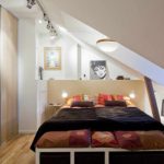 example of a bright design of a bedroom in the attic picture