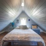 пример сјајне спаваће собе у унутрашњости фотографије на тавану