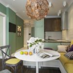 Um exemplo de design brilhante de uma cozinha de sala de estar 16 m² Foto