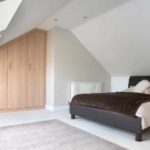 the idea of ​​a bright decor of a bedroom in the attic picture