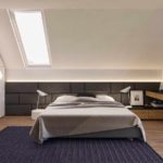 Option für einen schönen Stil eines Schlafzimmers auf dem Dachboden Foto