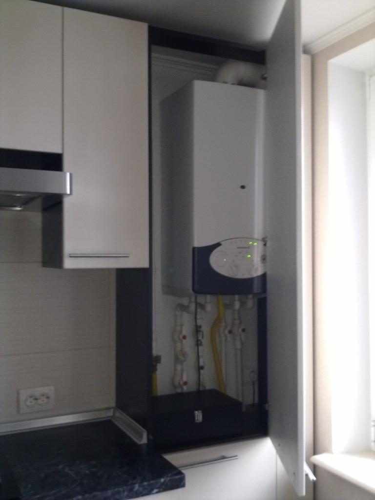 An example of a bright style kitchen with a gas boiler