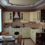 Layered ceiling in the design of the kitchen