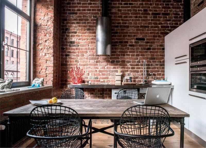Steel wire chairs in the kitchen in a loft style
