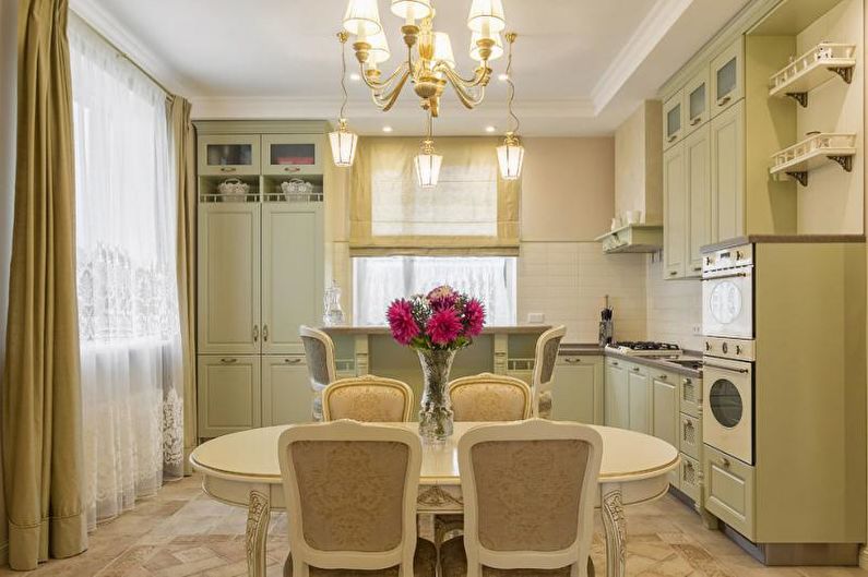 Classic chandelier in the design of the kitchen-dining room
