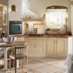 Đồ nội thất bằng gỗ trong một nhà bếp ấm cúng theo phong cách của Provence