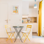 Yellow color as accents in the design of the kitchen