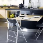 The use of folding furniture in the design of the kitchen