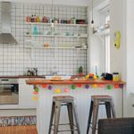 White tiled kitchen shelves