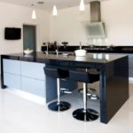 Black color in the interior of a spacious kitchen