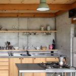 Concrete walls in industrial style kitchen
