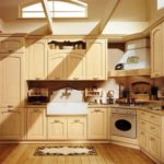 Kitchen made of natural light wood with beautiful decorative elements