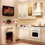 The original idea of ​​designing a kitchen with a ledge - installing a fireplace