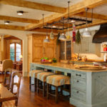 Spacious kitchen in a wooden house in the style of Provence