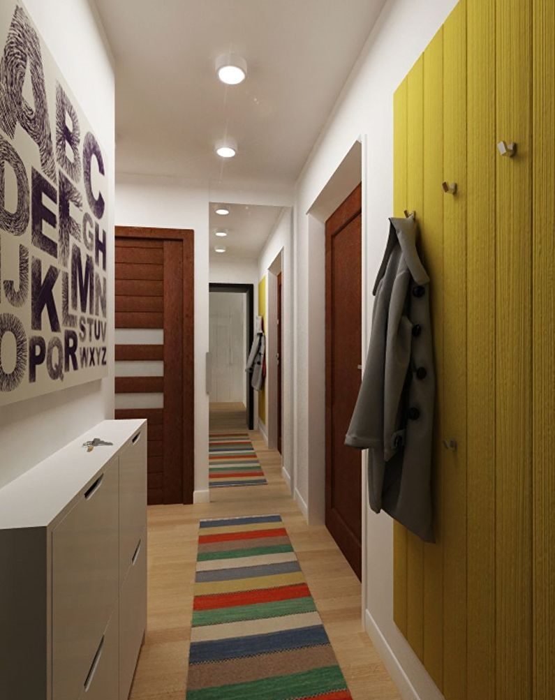 Narrow furniture in a small corridor of a city apartment