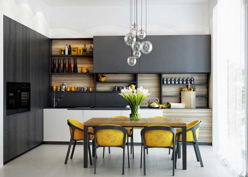 Cadeiras amarelas na cozinha com um conjunto preto
