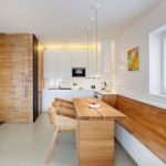 Wood in the design of the dining room kitchen