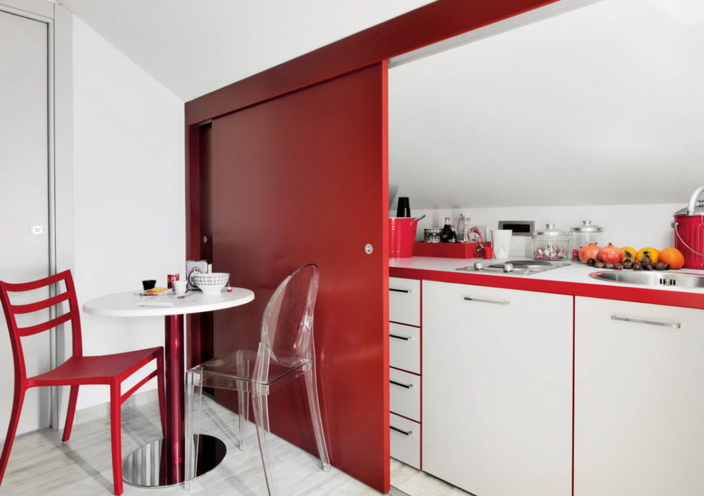 Kitchen niche with red sliding doors