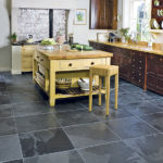 Dark porcelain tiles in the kitchen of a private house