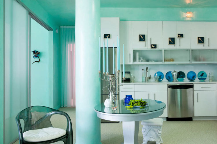 White set in a turquoise kitchen-dining room