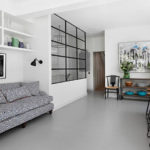 Geometric sofa - bright accent for a white kitchen