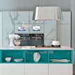 Turquoise shelves in white furniture
