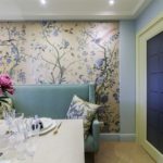 Wallpaper with flowers on the kitchen wall