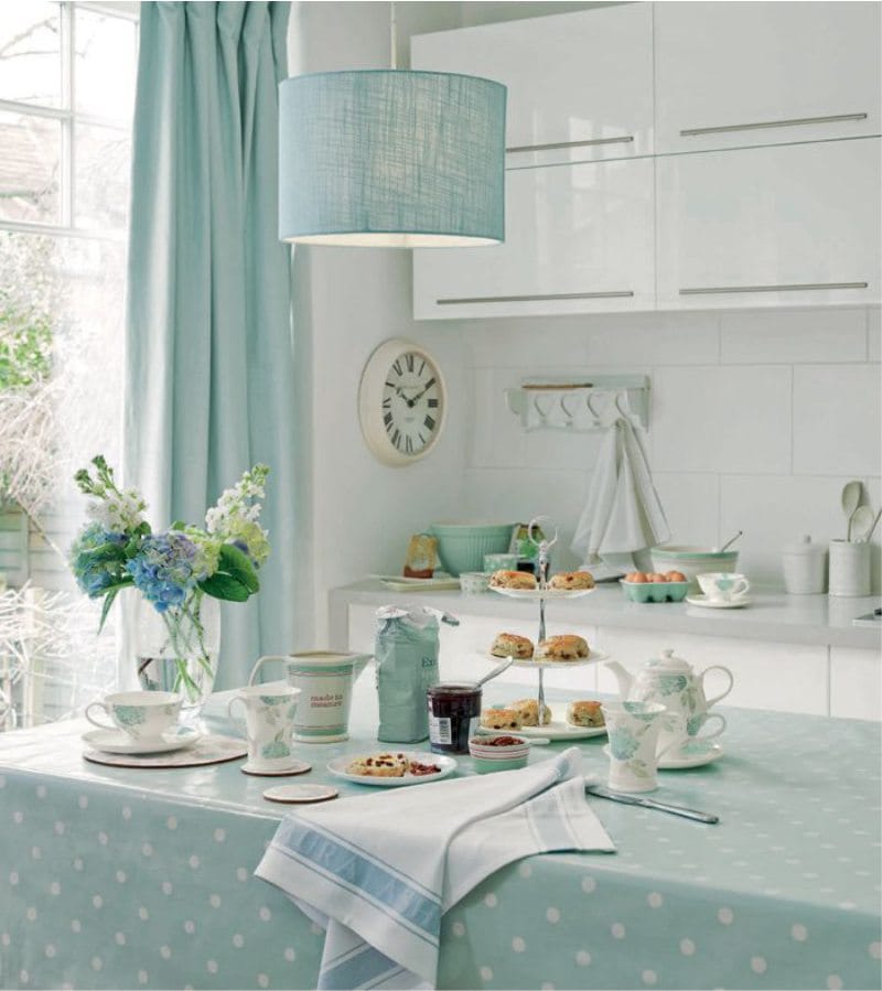 Mint color textiles in a kitchen interior