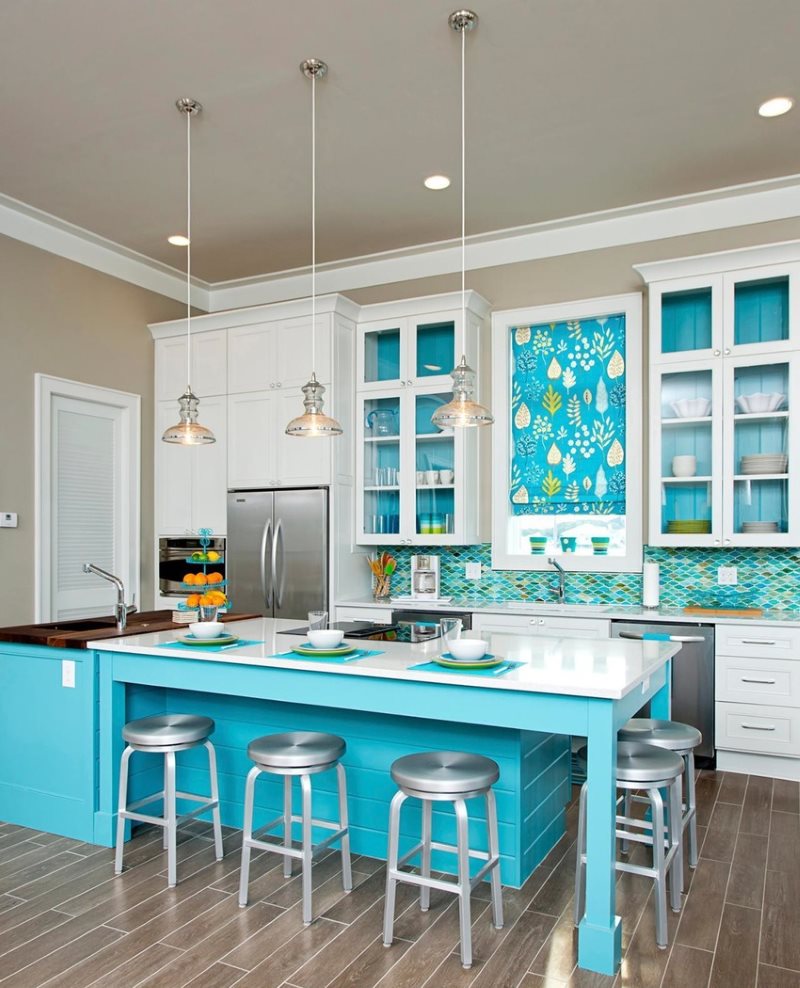 Interior of a turquoise kitchen in a modern style