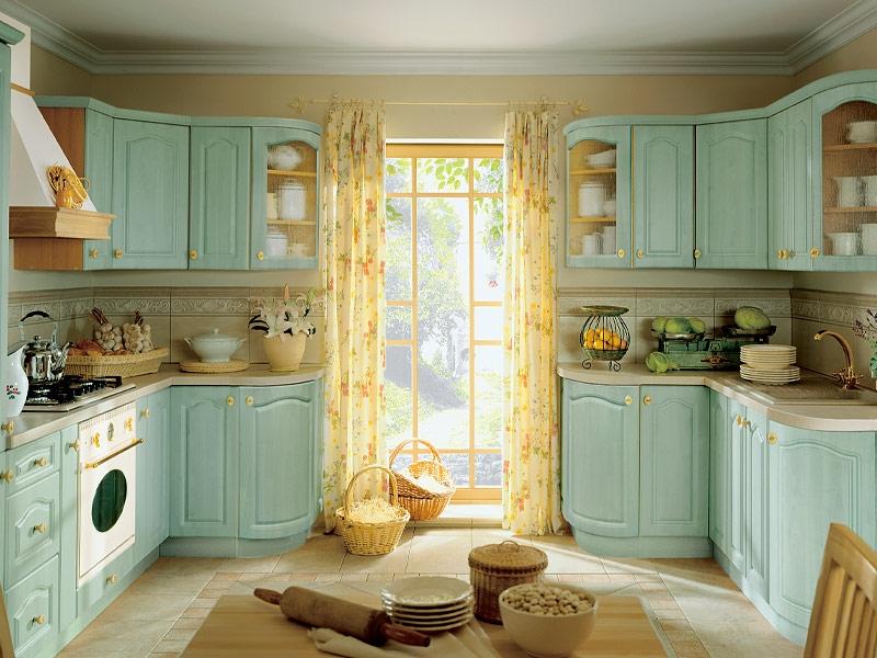 Mint kitchen with a door to the garden of a country house