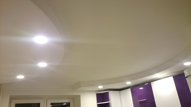 White kitchen ceiling with spotlights