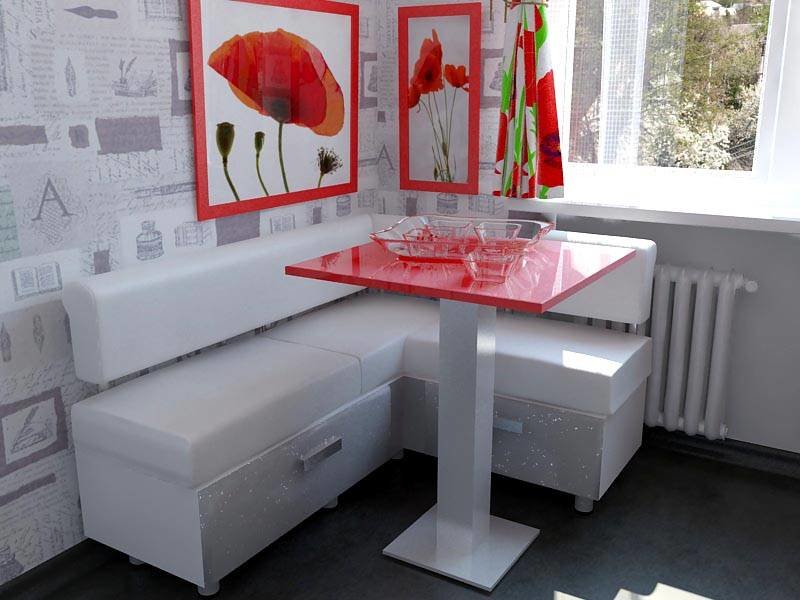 Colț de bucătărie cu o masă roșie compactă