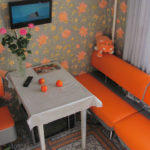 Soft corner with orange seats
