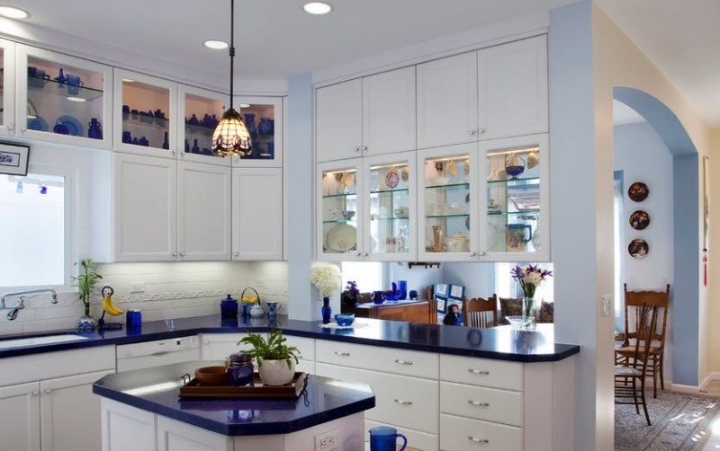 Furniture set with a blue countertop in the kitchen of a private house