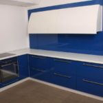 Corner blue and white headset with lower cabinets
