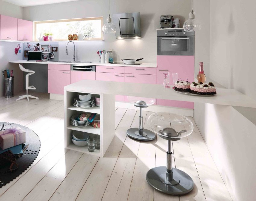 Pink suite on the background of a white wall of the kitchen