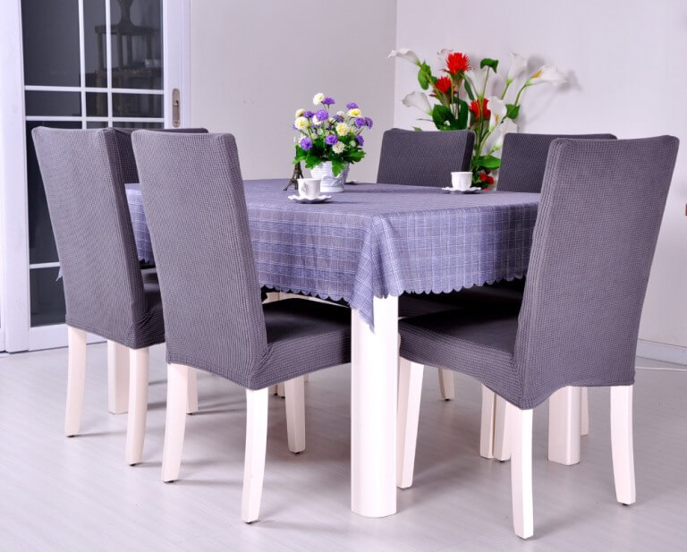 White chairs with lilac satin covers