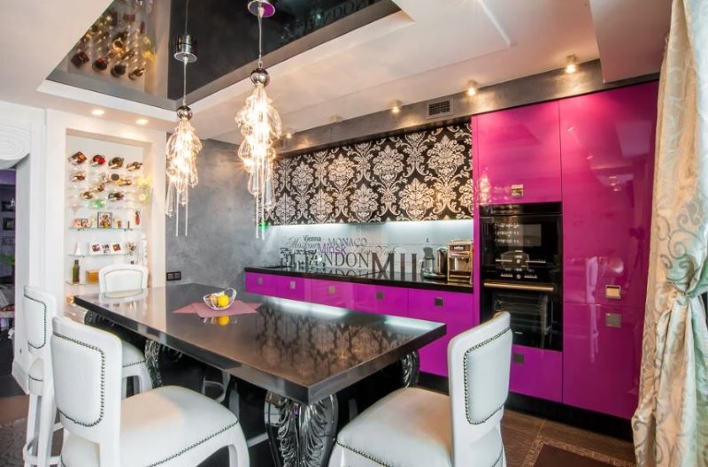 The interior of the kitchen in a combination of pink and black