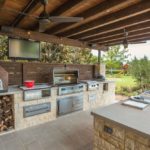 Work area of ​​summer kitchen with barbecue
