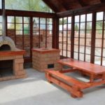 Barbecue in summer arbor with glazing