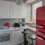 Red refrigerator in retro style