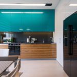 Linear kitchen with glossy facades