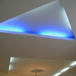 Illuminated triangular niche on the kitchen ceiling